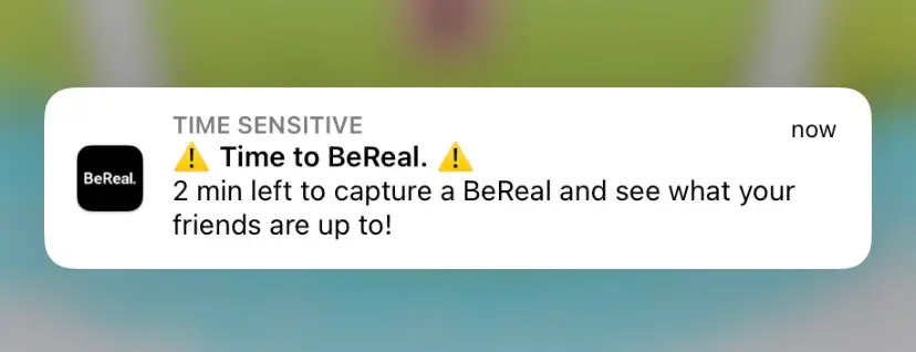 BeReal Push Notification - The notification for the social media app with 2 minutes notice photo.