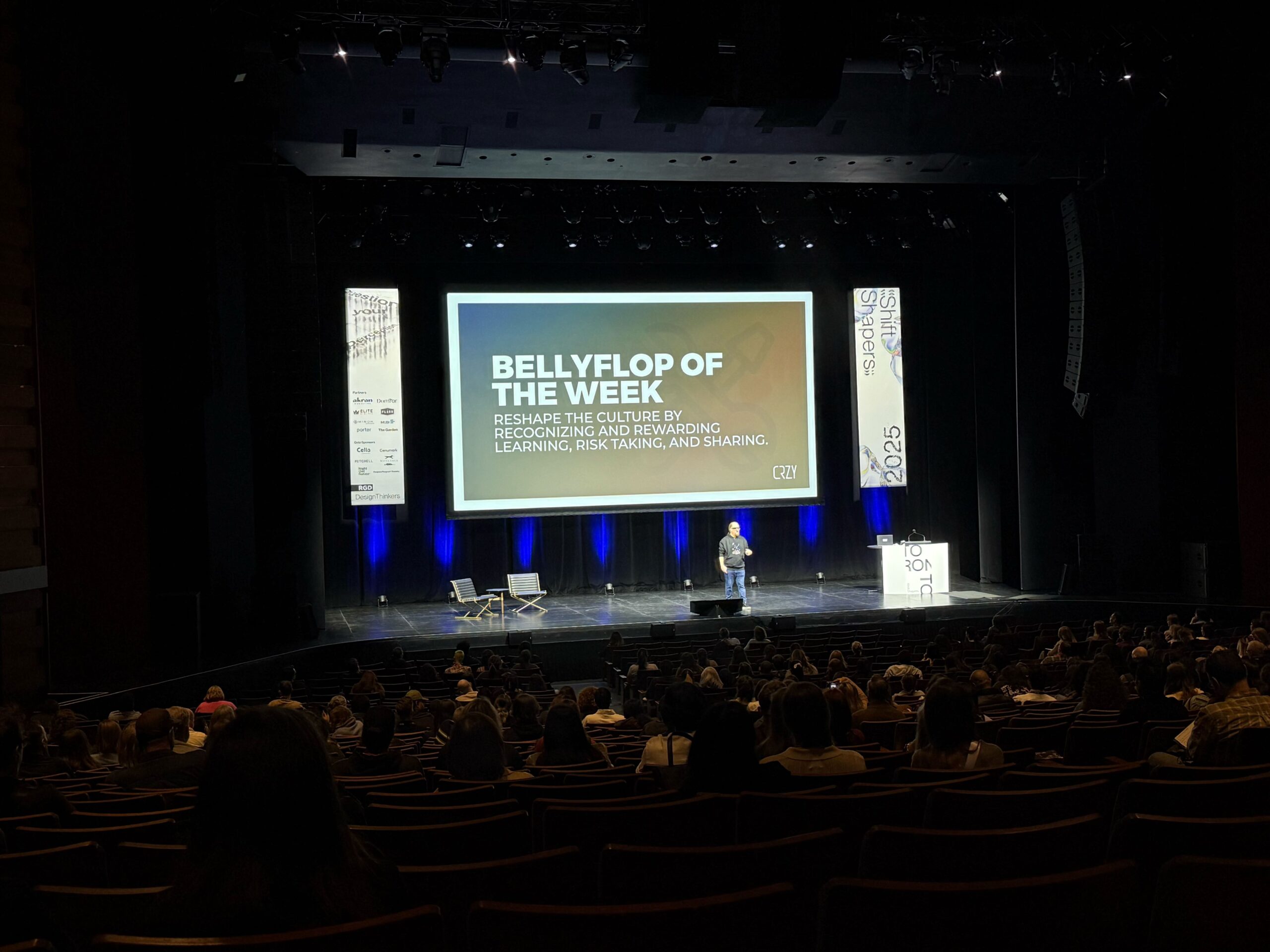 A slide from Stephen Gates' presentation that says "Bellyflop of the week. Reshape the culture by recognizing and rewarding learning, risk taking, and sharing."